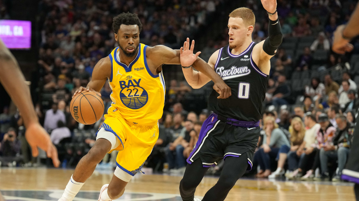 Golden State Warriors guard Donte DiVincenzo and forward Andrew Wiggins