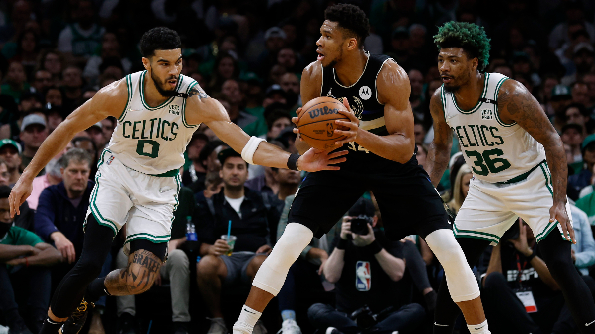 Boston Celtics forward Jayson Tatum and guard Marcus Smart, Milwaukee Bucks forward Giannis Antetokounmpo