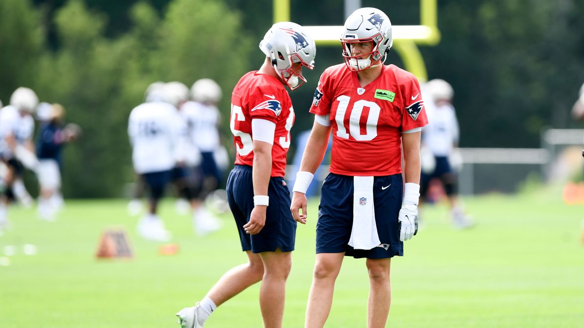 New England Patriots quarterback Mac Jones and Bailey Zappe