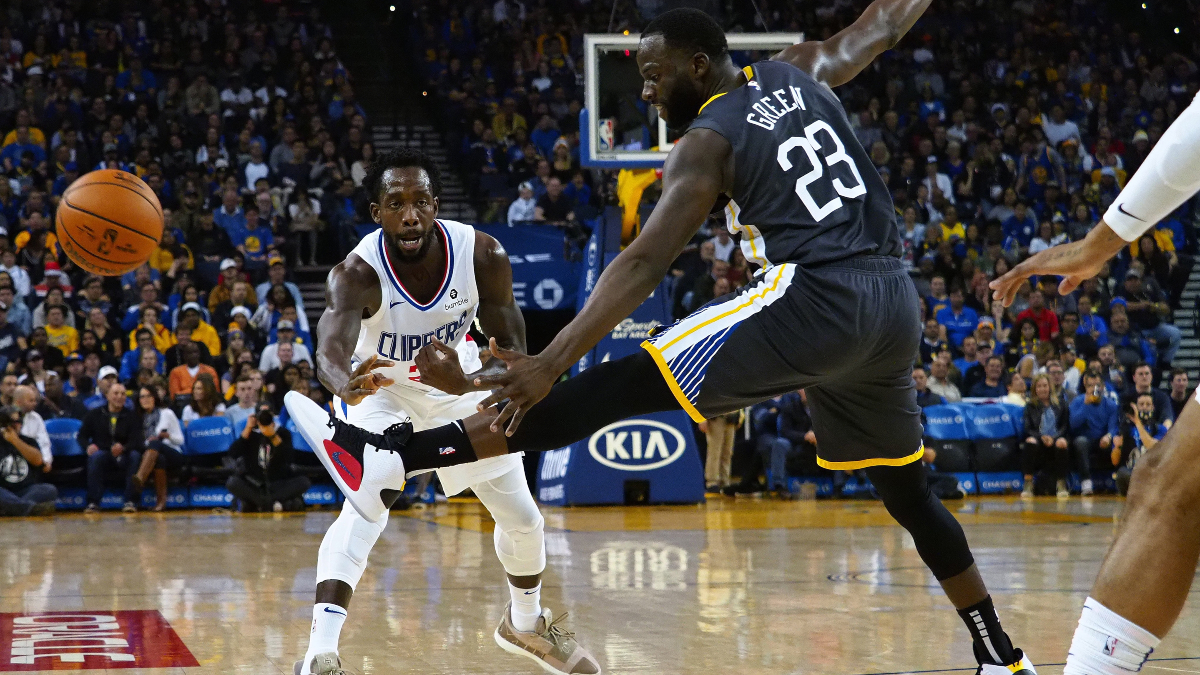 Lakers guard Patrick Beverley and Warriors forward Draymond Green
