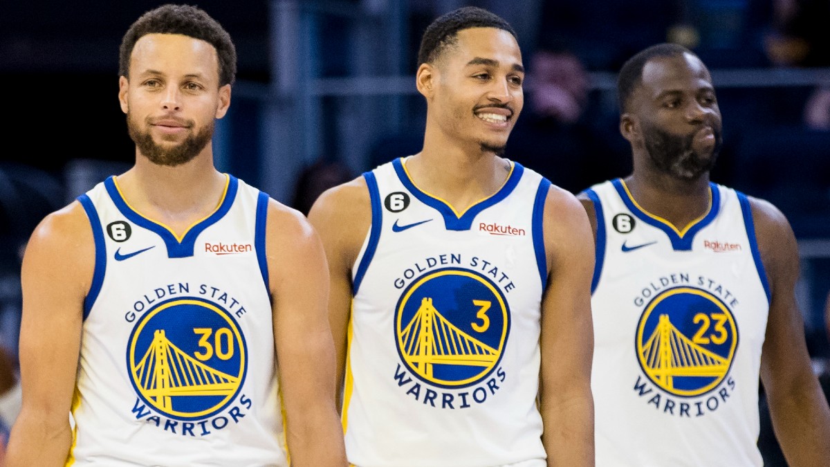 Golden State Warriors guard Stephen Curry (30), guard Jordan Poole (3), forward Draymond Green (23)