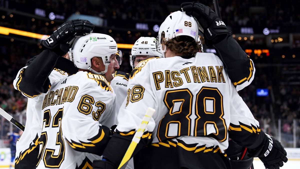 Boston Bruins forward David Pastrnak and Brad Marchand