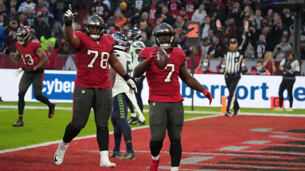 Tampa Bay Buccaneers offensive tackle Tristan Wirfs and running back Leonard Fournette