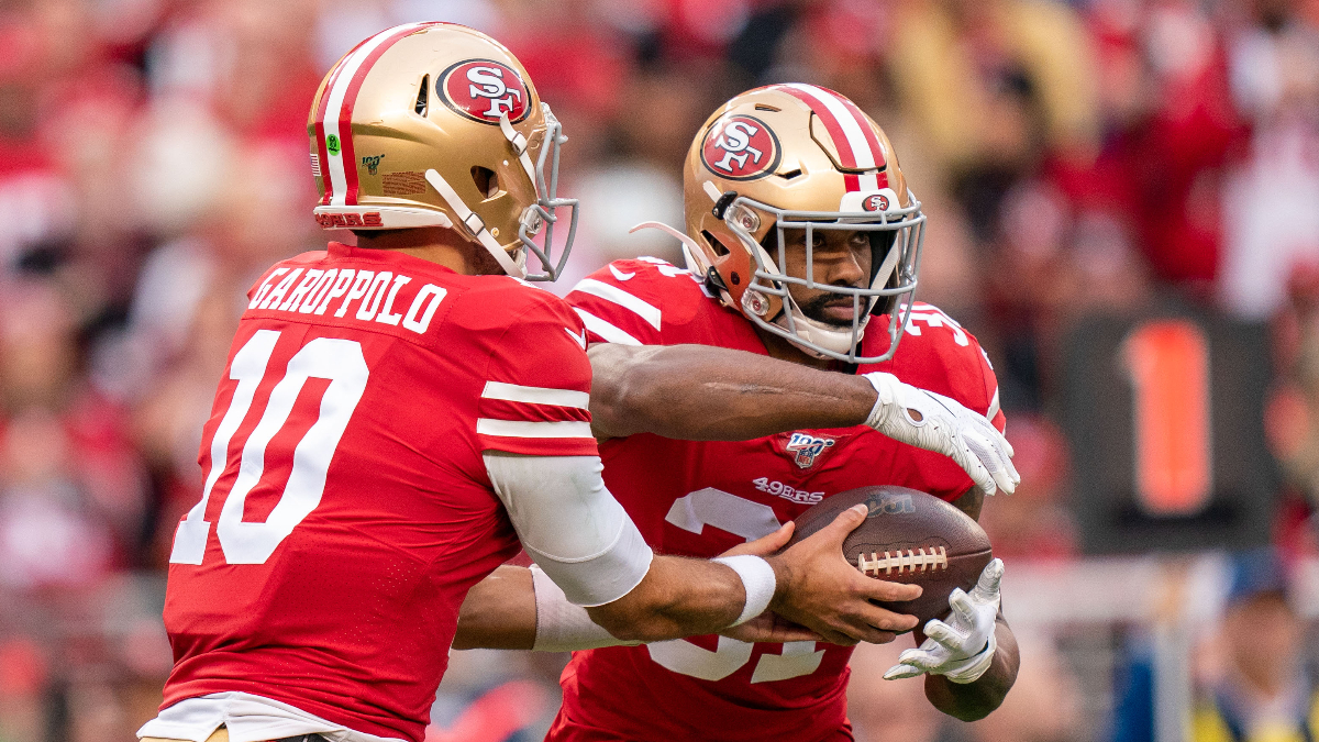 Miami Dolphins running back Raheem Mostert, San Francisco 49ers quarterback Jimmy Garoppolo