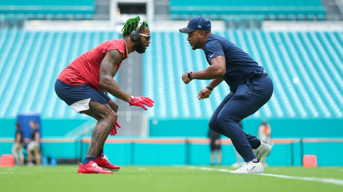 New England Patriots receivers coach Ross Douglas and cornerback Jalen Mills