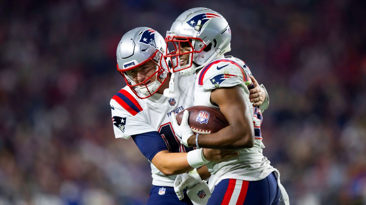 New England Patriots quarterback Mac Jones and running back Pierre Strong