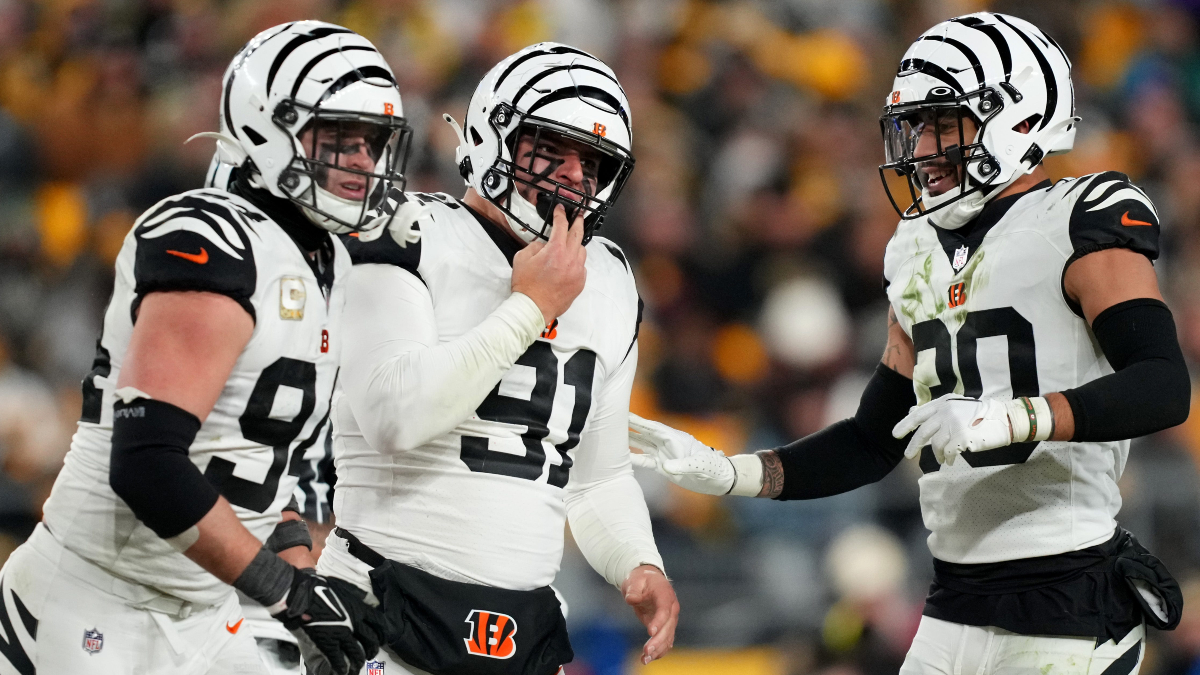 Cincinnati Bengals defensive ends Sam Hubbard and Trey Hendrickson and safety Jessie Bates