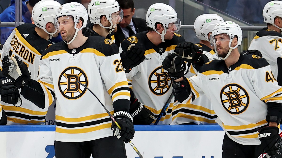 Boston Bruins defenseman Derek Forbort, center David Krejci