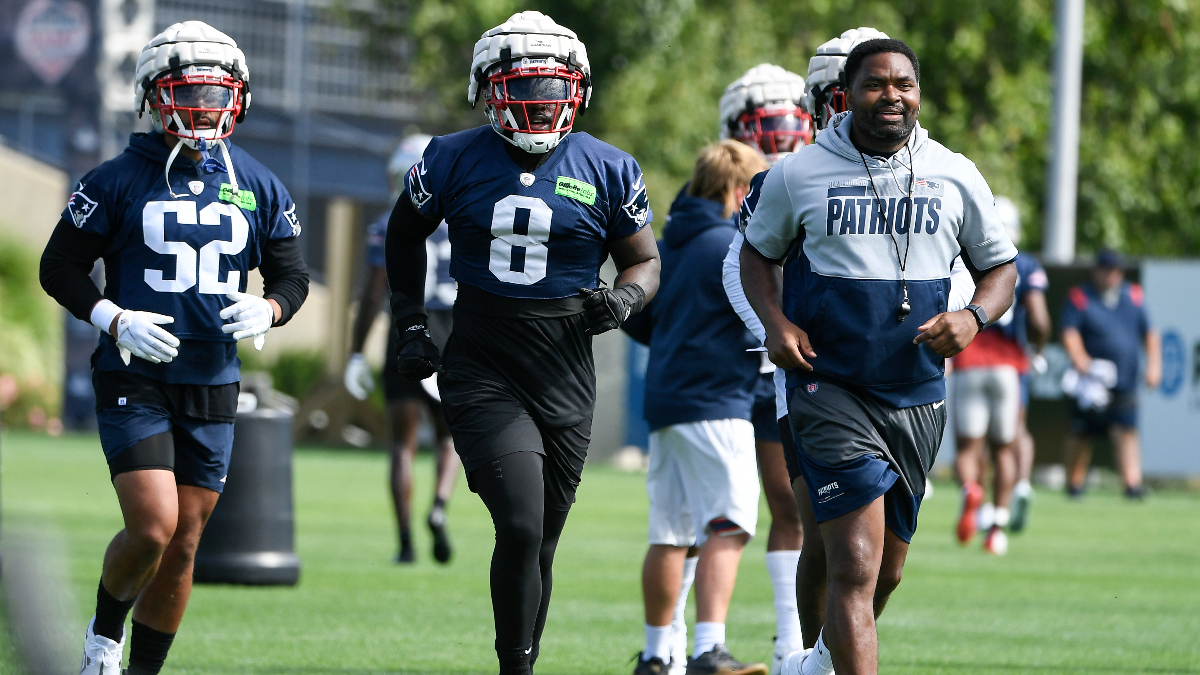 New England Patriots defensive back Marcus Jones, linebacker Ja'Whaun Bentley, linebackers coach Jerod Mayo
