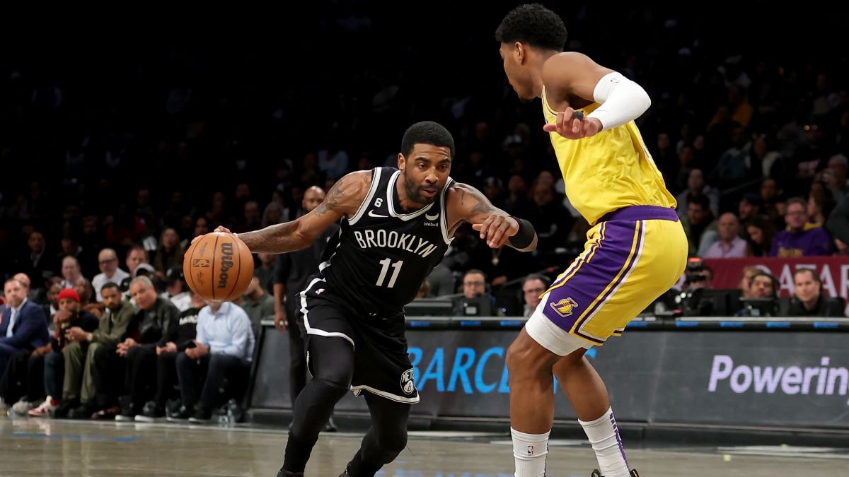 Dallas Mavericks guard Kyrie Irving and Los Angeles Lakers forward Rui Hachimura