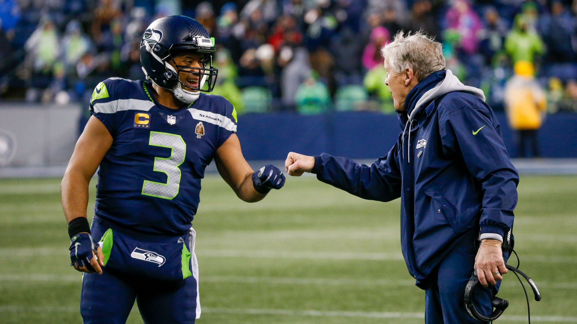 Seattle Seahawks head coach Pete Carroll, Denver Broncos quarterback Russell Wilson
