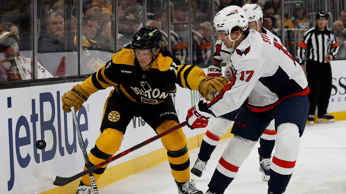 Boston Bruins center Trent Frederic, Washington Capitals center Dylan Strome