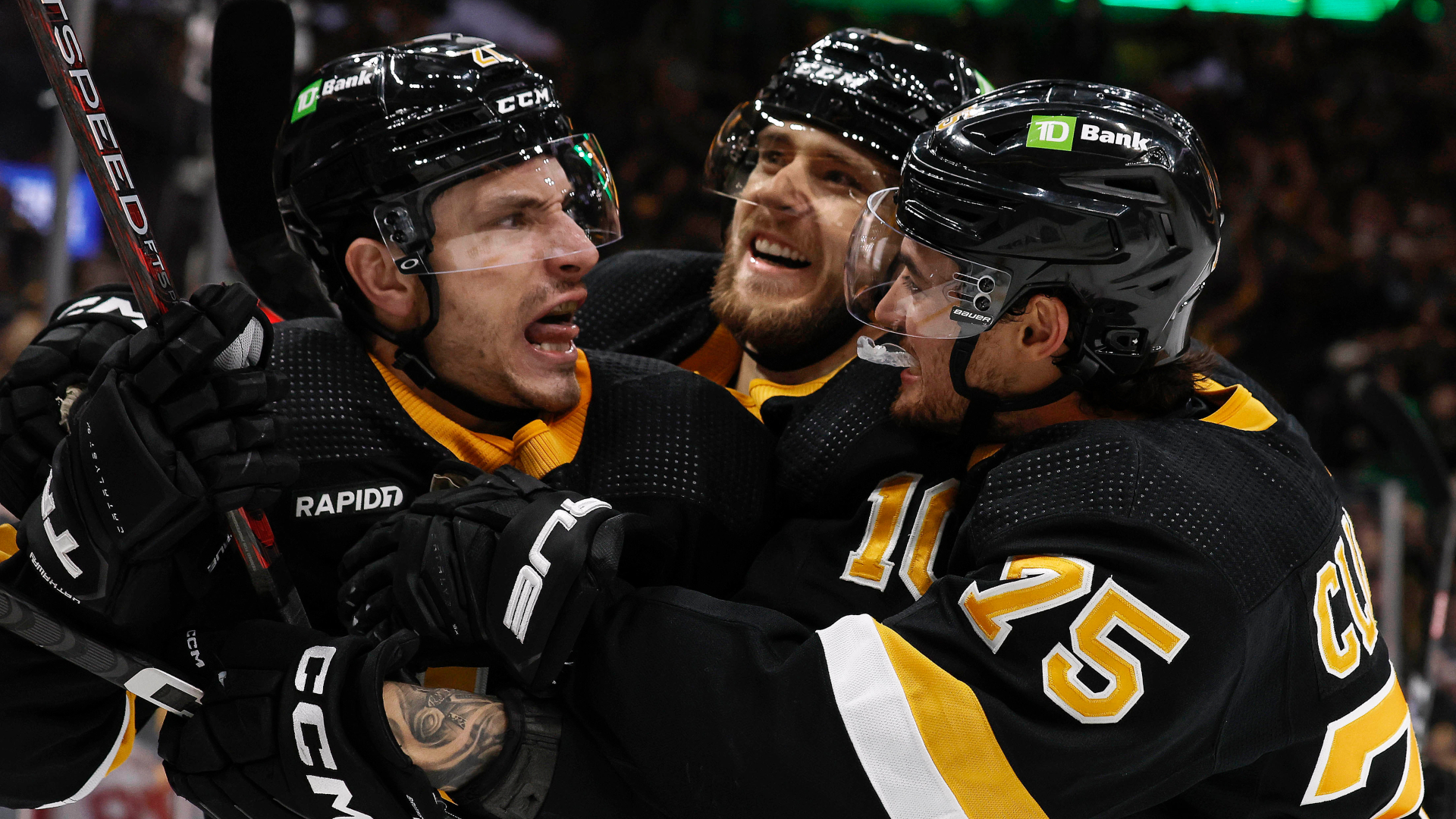 Boston Bruins defensemen Dmitry Orlov and Connor Clifton and forward A.J. Greer
