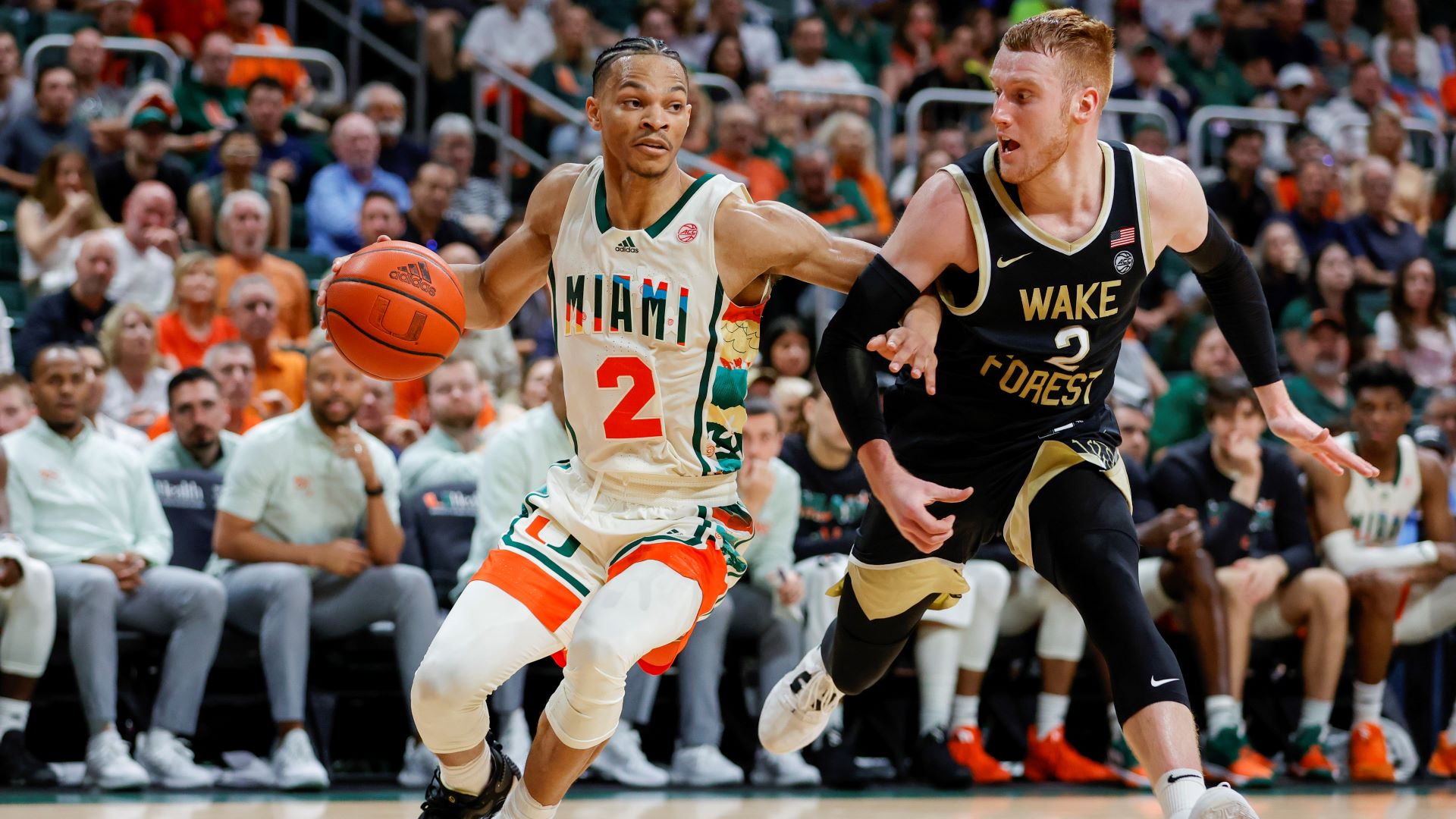 Miami guard Isaiah Wong and Wake Forest guard Cameron Hildreth