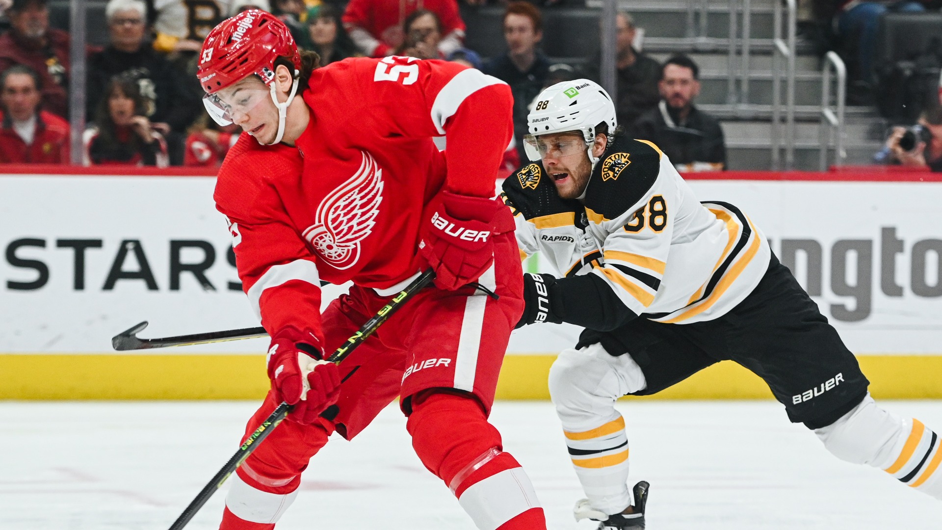 Detroit Red Wings defenseman Moritz Seider, Boston Bruins right wing David Pastrnak