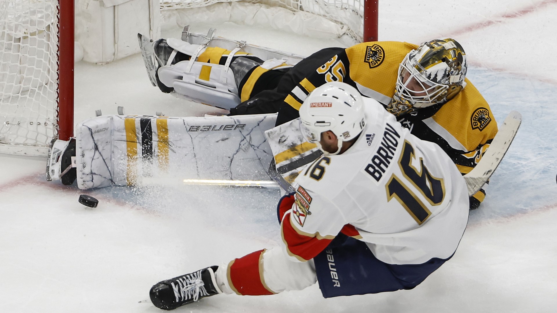 Florida Panthers forward Alexsander Barkov, Boston Bruins goalie Linus Ullmark