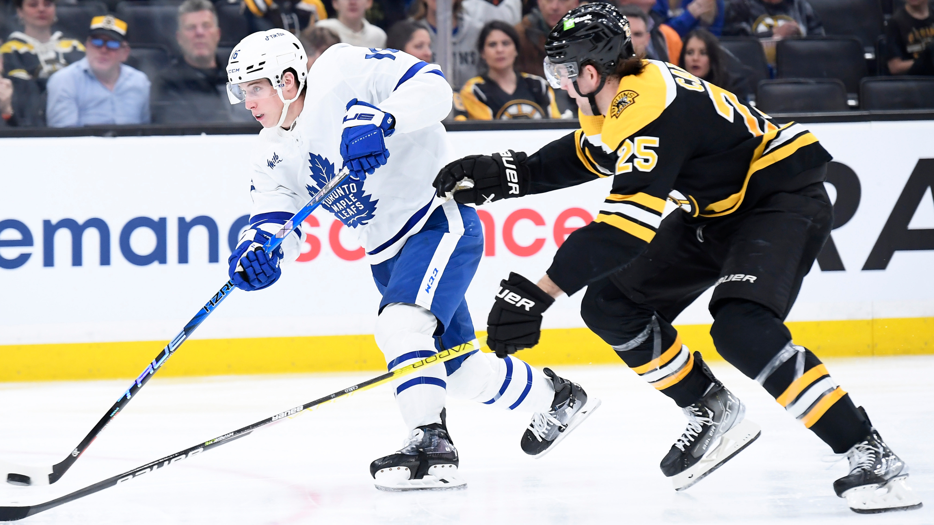 Boston Bruins defenseman Brandon Carlo and Toronto Maple Leafs forward Mitchell Marner