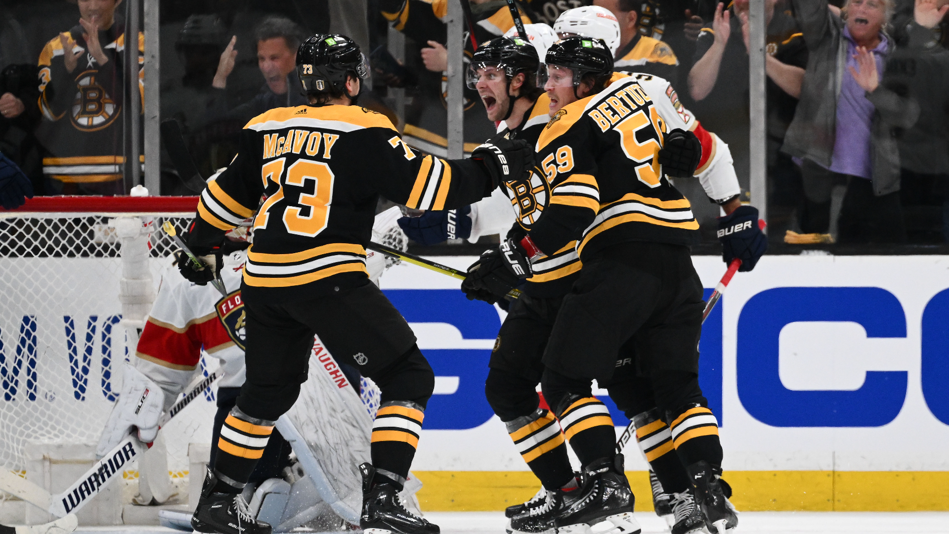 Boston Bruins defenseman Charlie McAvoy and forwards Pavel Zacha and Tyler Bertuzzi