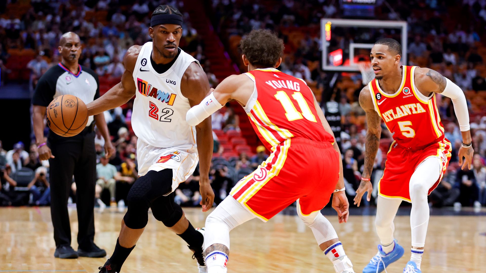 Miami Heat guard Jimmy Butler and Atlanta Hawks guard Trae Young