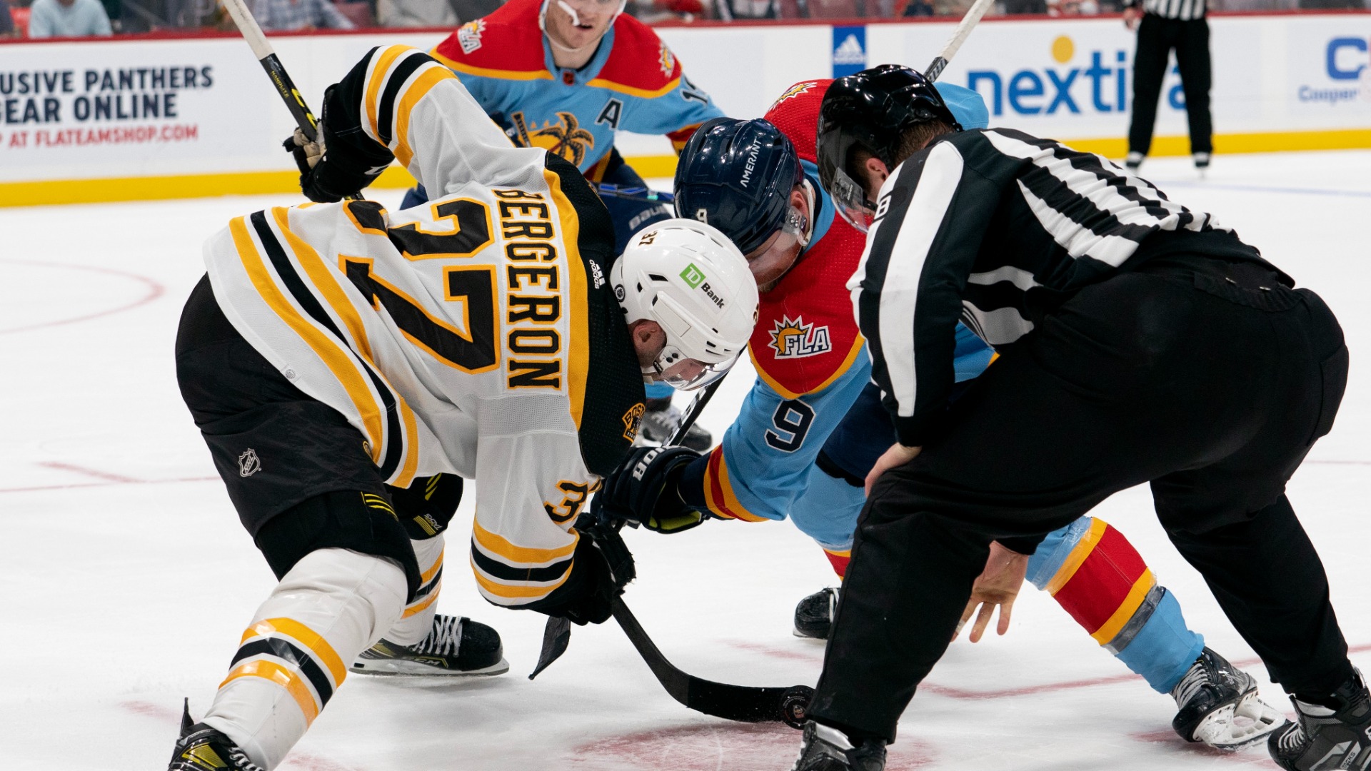 Boston Bruins center Patrice Bergeron and Florida Panthers center Sam Bennett