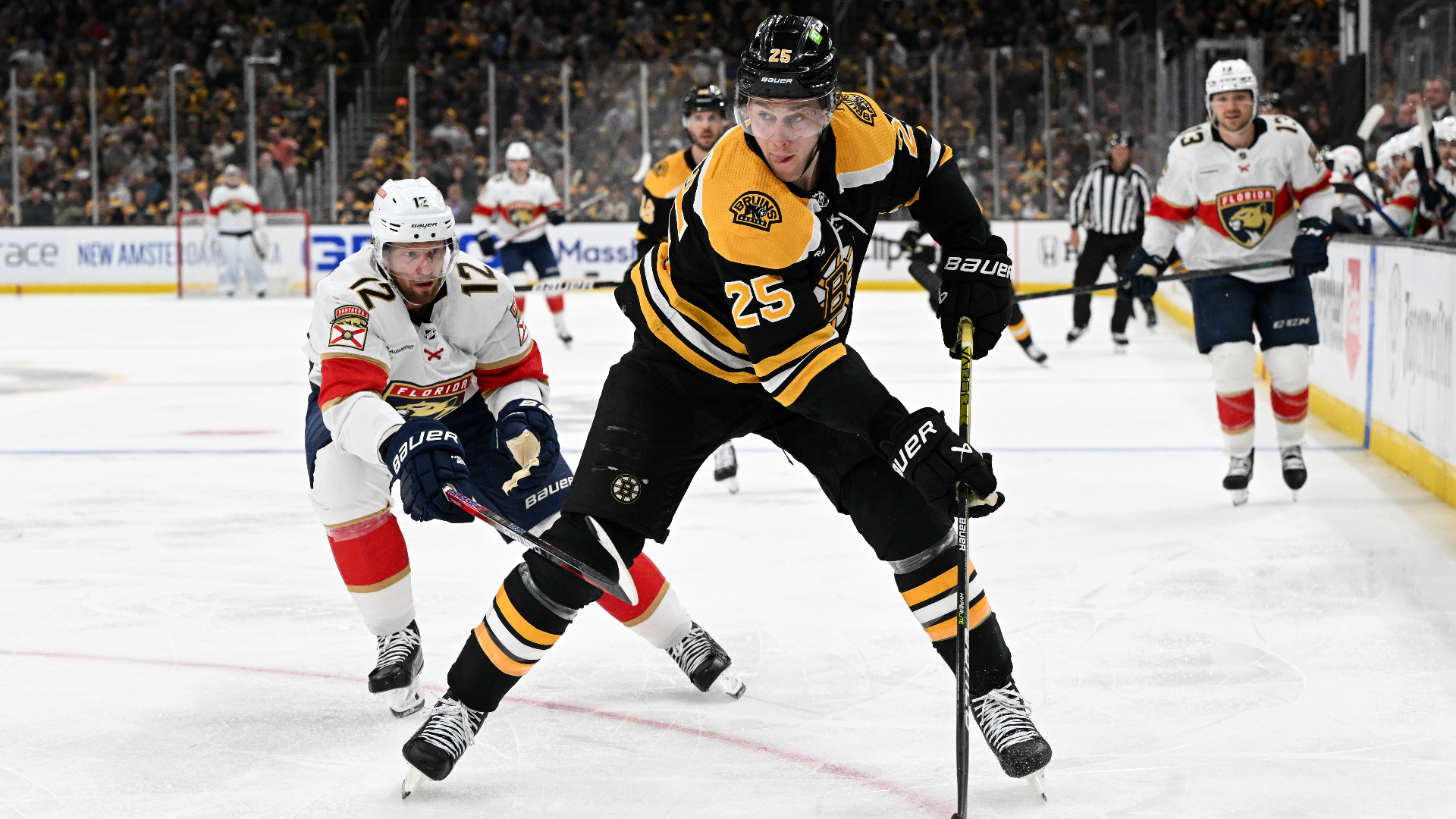 Boston Bruins defenseman Brandon Carlo, Florida Panthers center Eric Staal