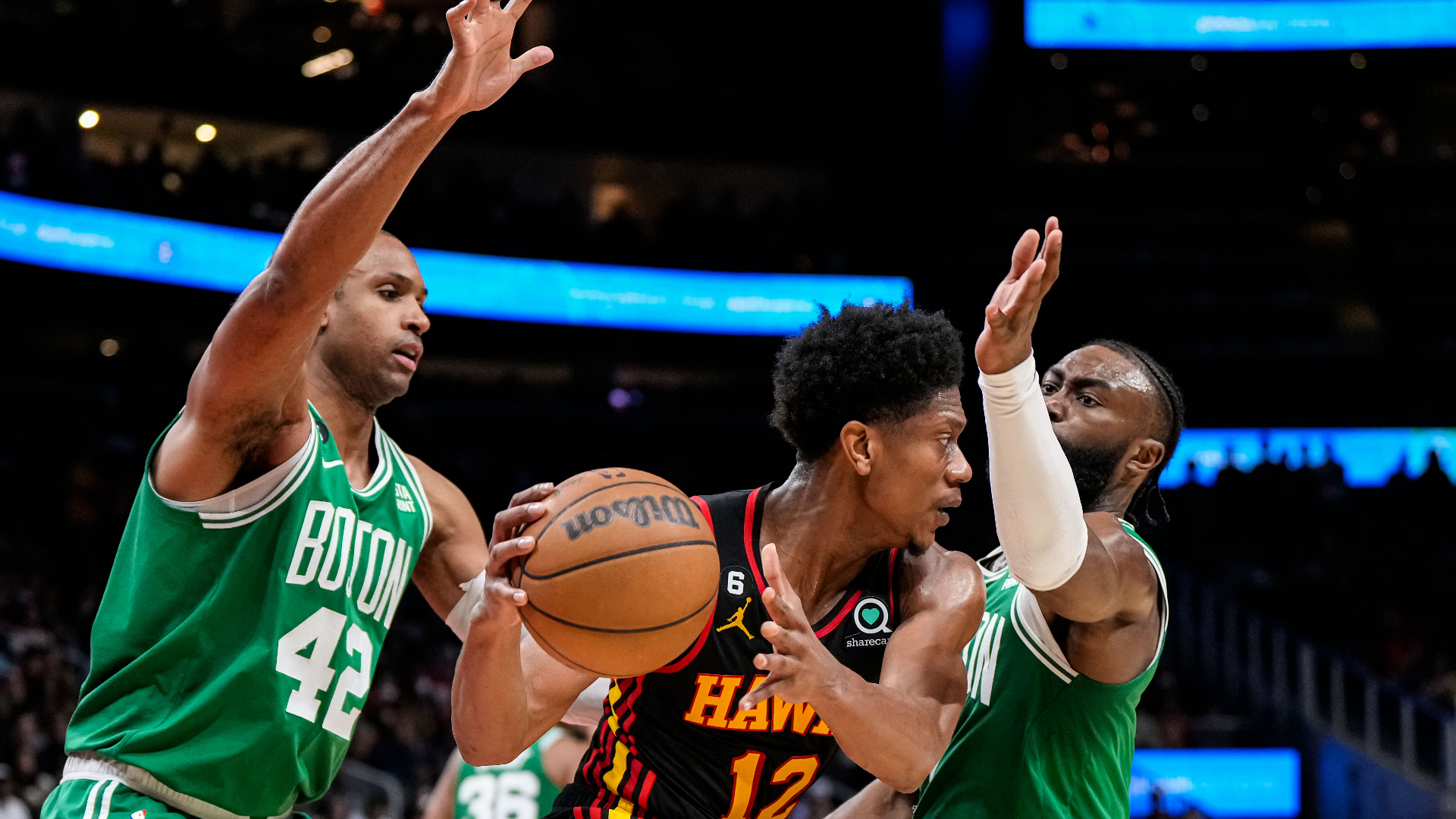 Atlanta Hawks forward De'Andre Hunter, Boston Celtics center Al Horford, guard Jaylen Brown