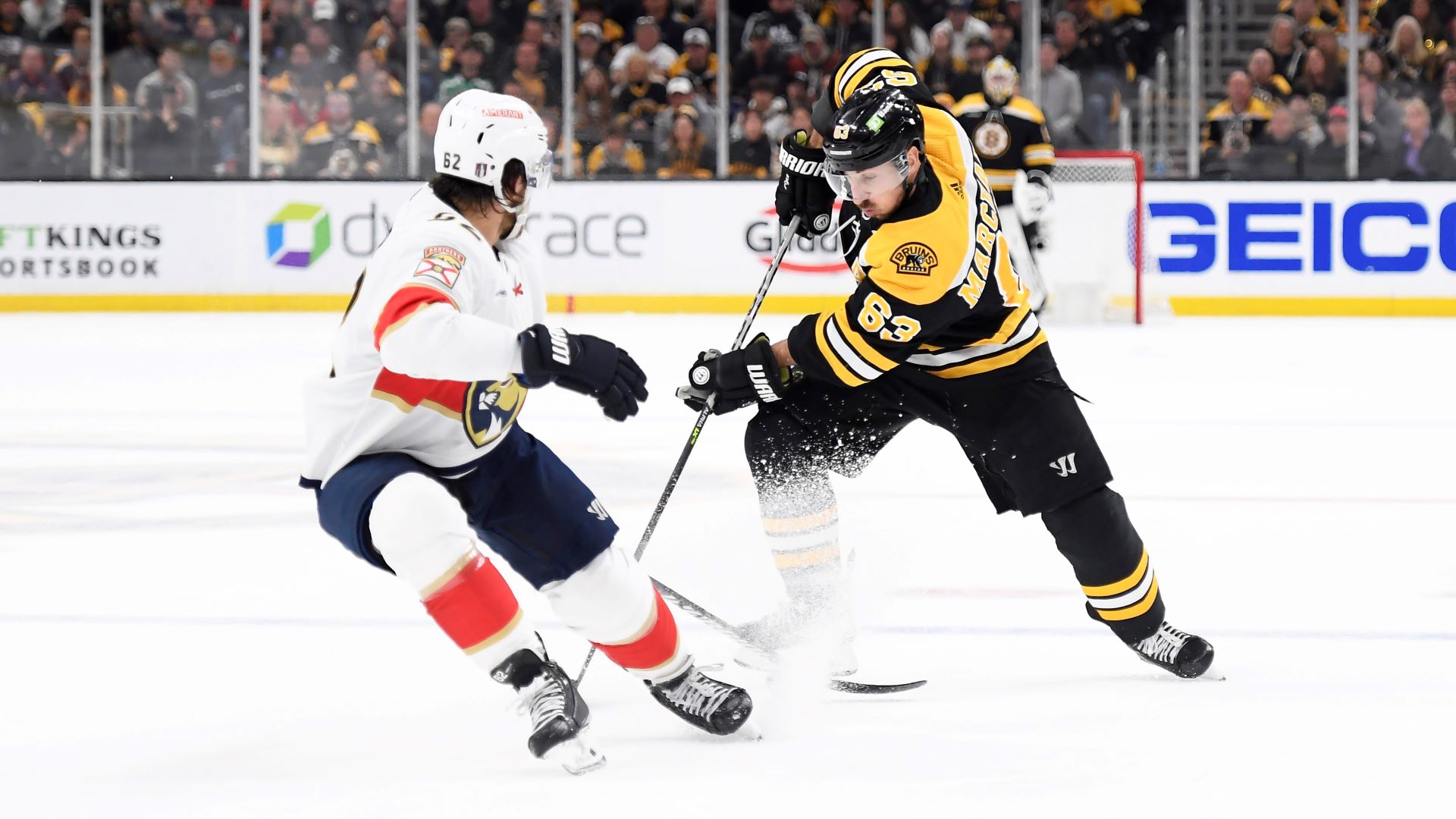Florida Panthers defenseman Brandon Montour and Boston Bruins left wing Brad Marchand