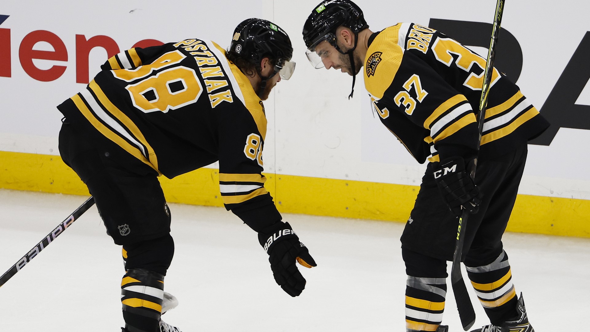 Boston Bruins forwards David Pastrnak, Patrice Bergeron