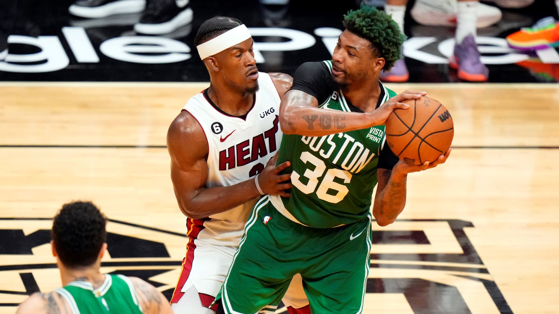 Miami Heat guard Jimmy Butler and Boston Celtics guard Marcus Smart