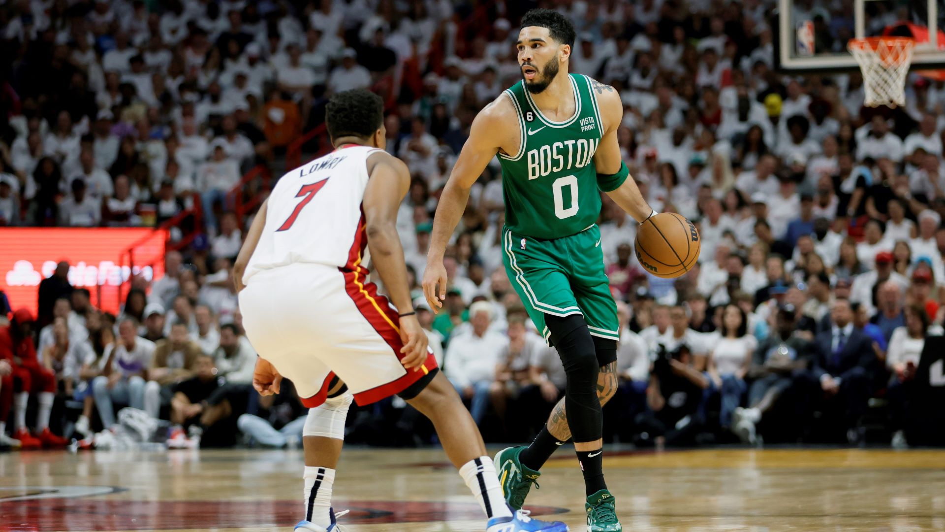 Miami Heat guard Kyle Lowry and Boston Celtics forward Jayson Tatum