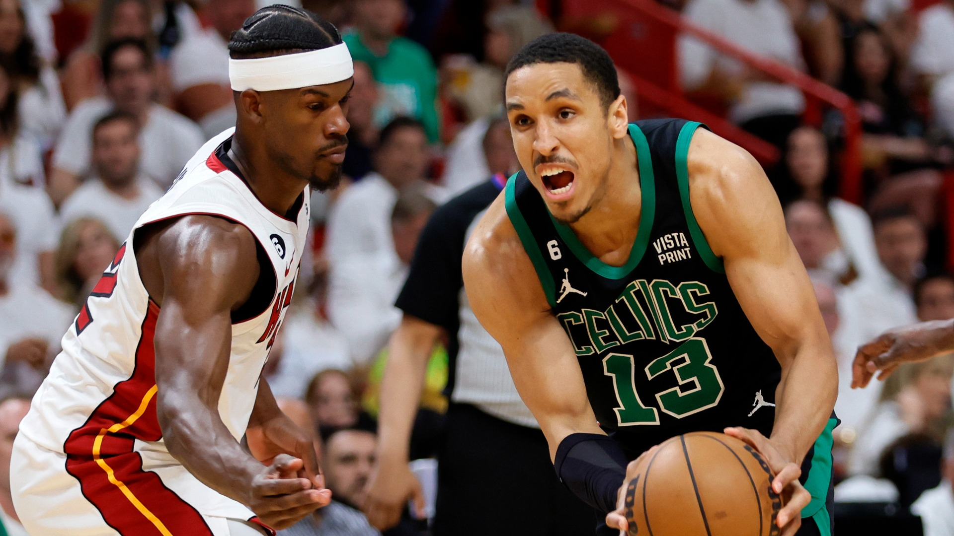 Boston Celtics guard Malcolm Brogdon and Miami Heat forward Jimmy Butler