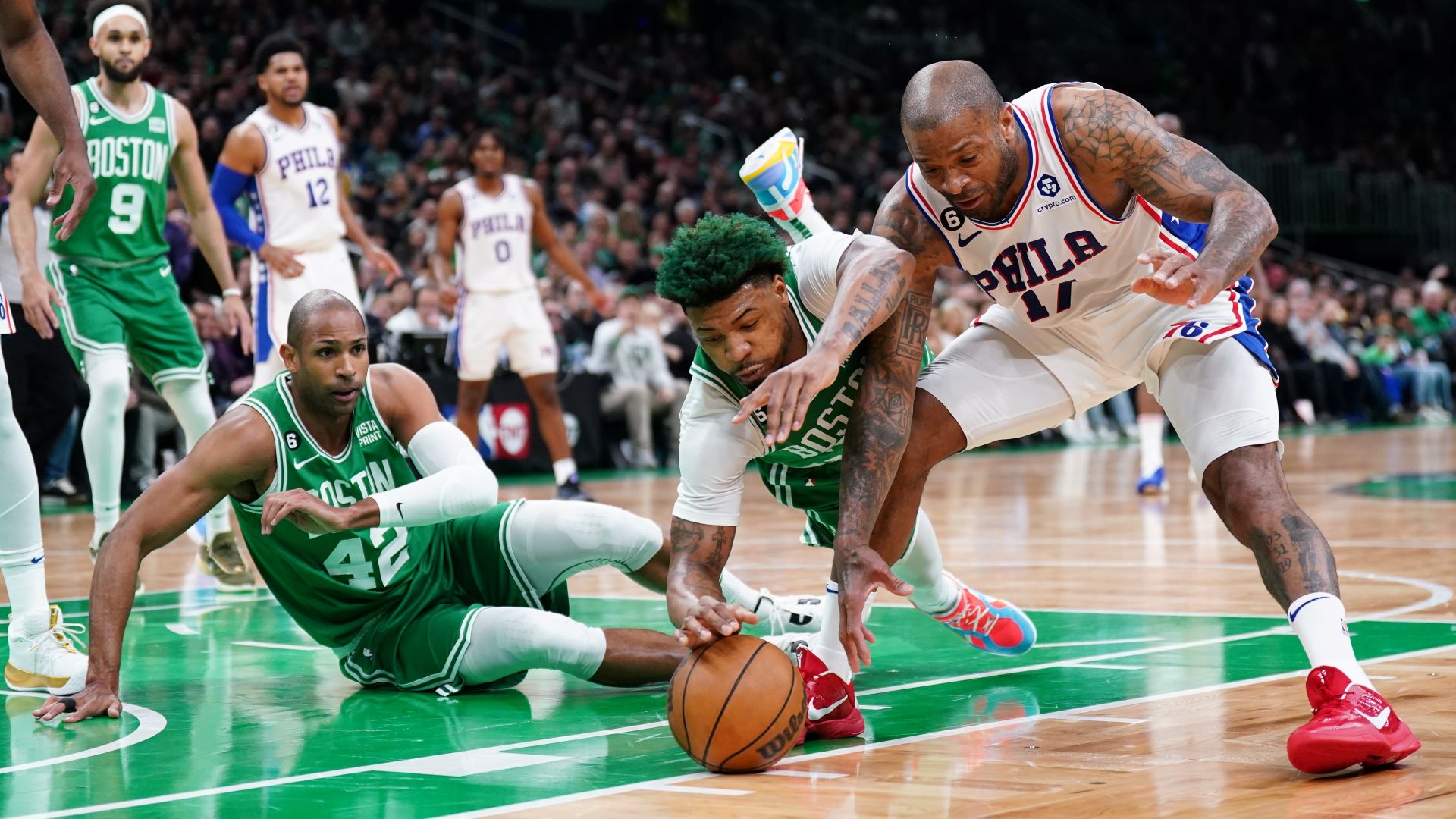 Boston Celtics guard Marcus Smart and Philadelphia 76ers forward P.J. Tucker