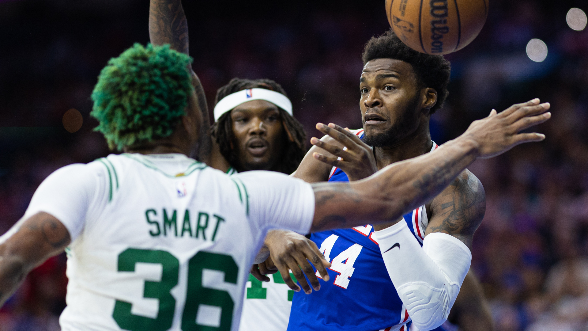 Boston Celtics guard Marcus Smart and center Robert Williams III and Philadelphia 76ers center Paul Reed