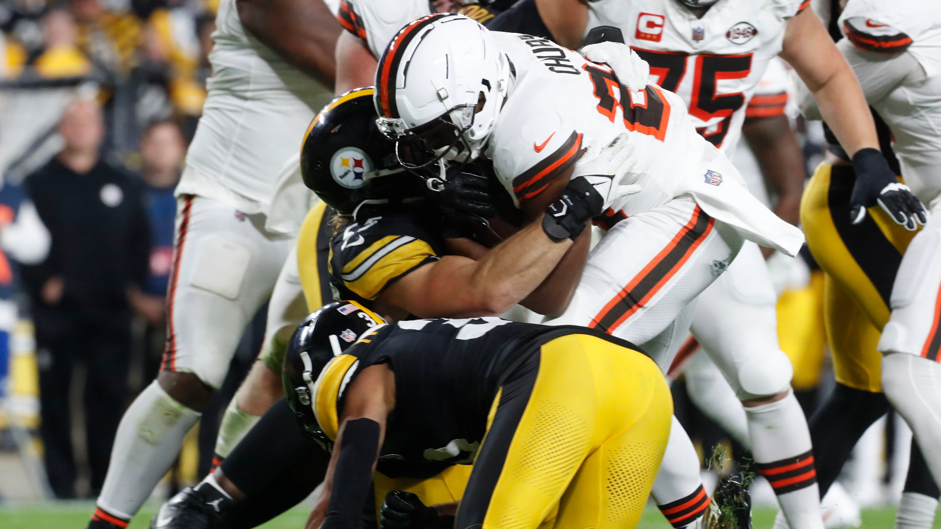 Cleveland Browns running back Nick Chubb, Pittsburgh Steelers linebacker Cole Holcomb, safety Minkah Fitzpatrick