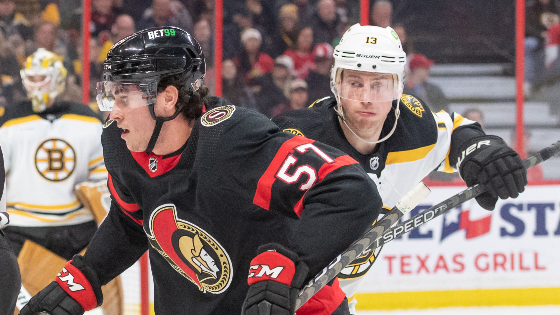 Ottawa Senators forward Shane Pinto and Boston Bruins forward Charlie Coyle