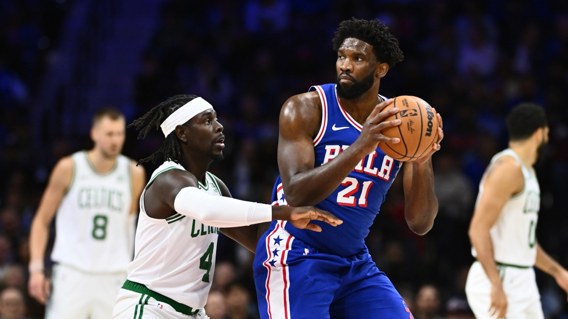 Boston Celtics guard Jrue Holiday and Philadelphia 76ers center Joel Embiid