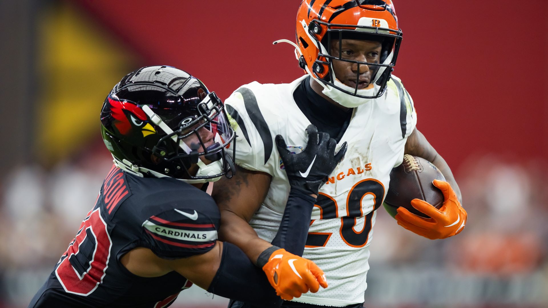 New England Patriots cornerback Marco Wilson and Cincinnati Bengals running back Joe Mixon