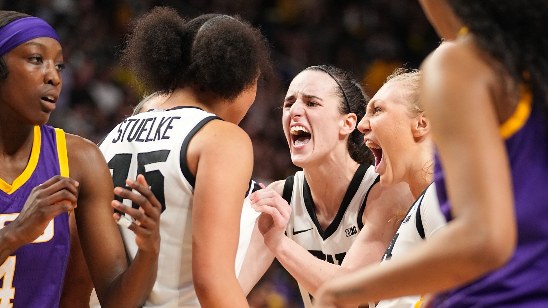 Iowa Hawkeyes forward Hannah Stuelke and guard Caitlin Clark