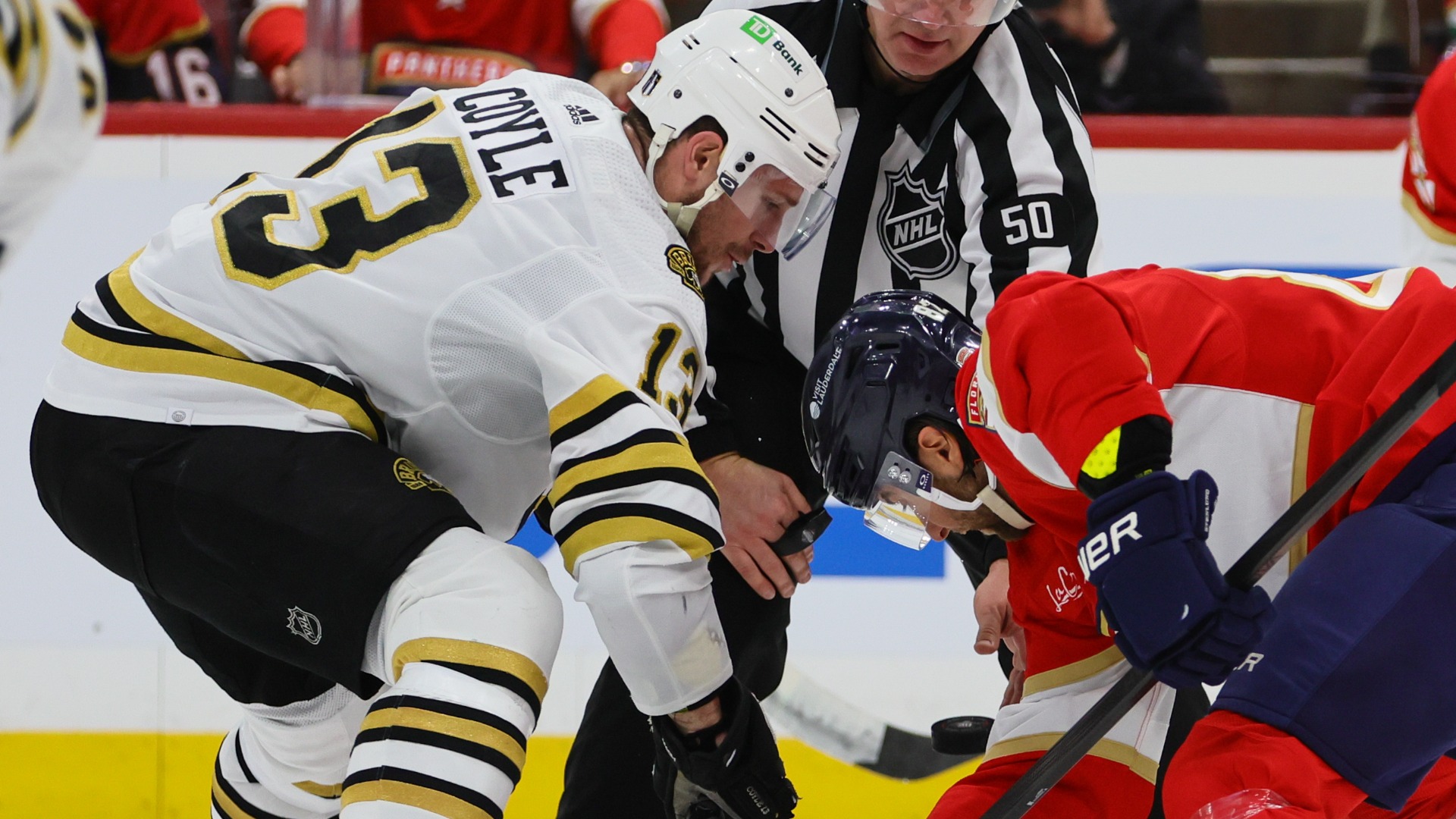 Boston Bruins center Charlie Coyle, Florida Panthers center Kevin Stenlund