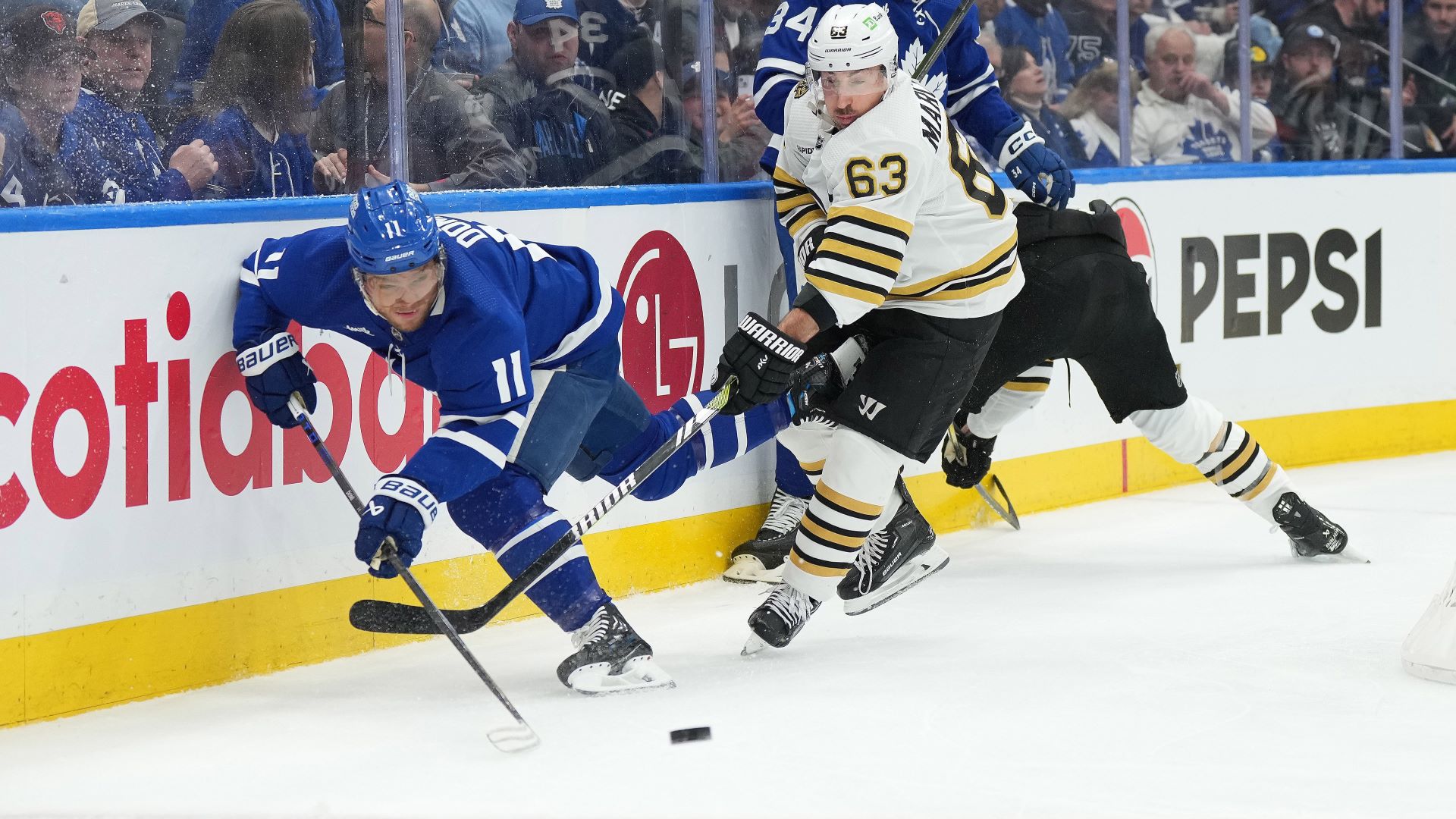 Toronto Maple Leafs forward Max Domi and Boston Bruins forward Brad Marchand