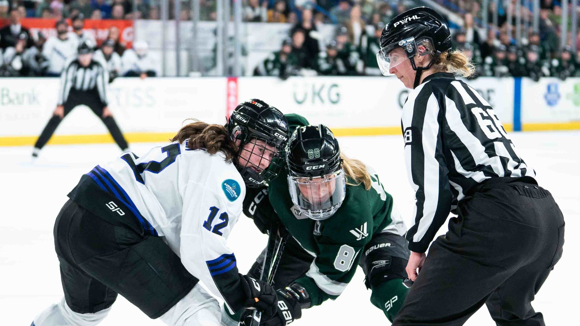 PWHL Boston forward Susanna Tapani and PWHL Minnesota forward Kelly Pannek