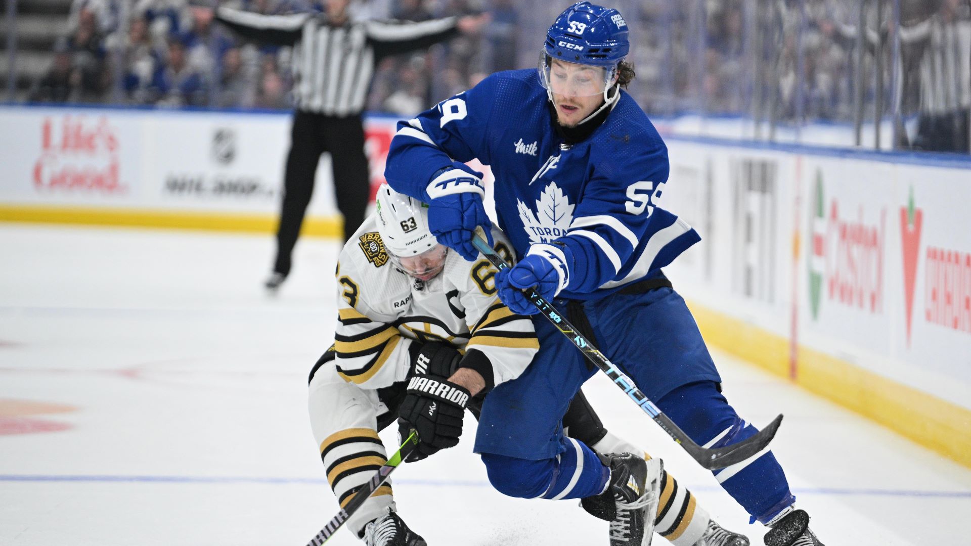 Toronto Maple Leafs forward Tyler Bertuzzi and Boston Bruins forward Brad Marchand