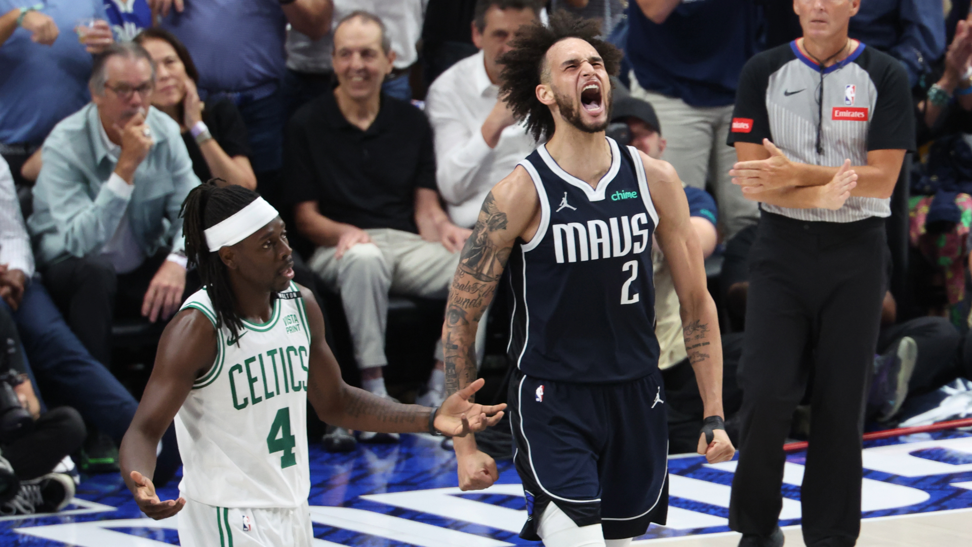 Boston Celtics guard Jrue Holiday and Dallas Mavericks center Derreck Lively II
