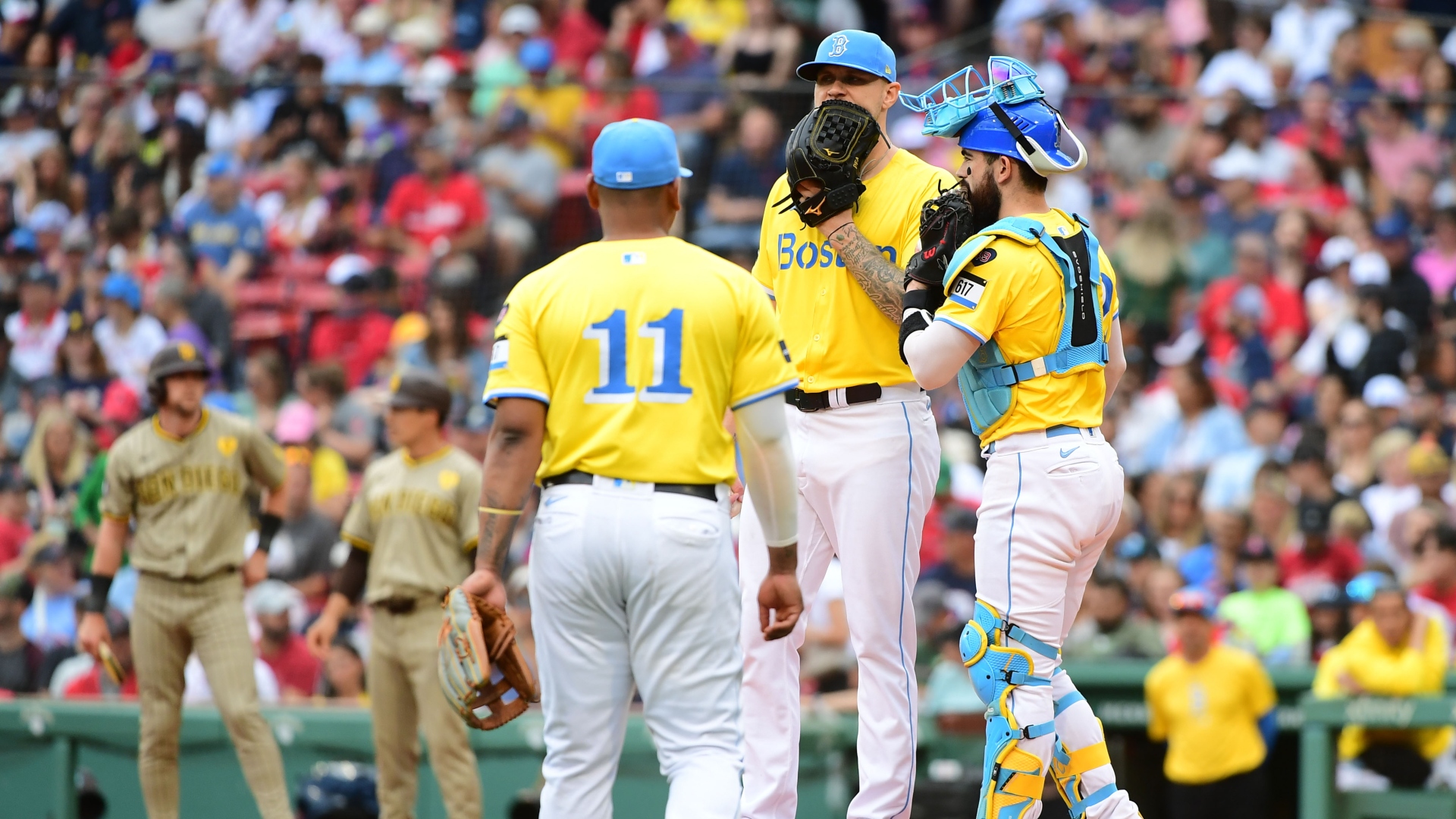 Boston Red Sox pitcher Tanner Houck, third baseman Rafael Devers and catcher Connor Wong