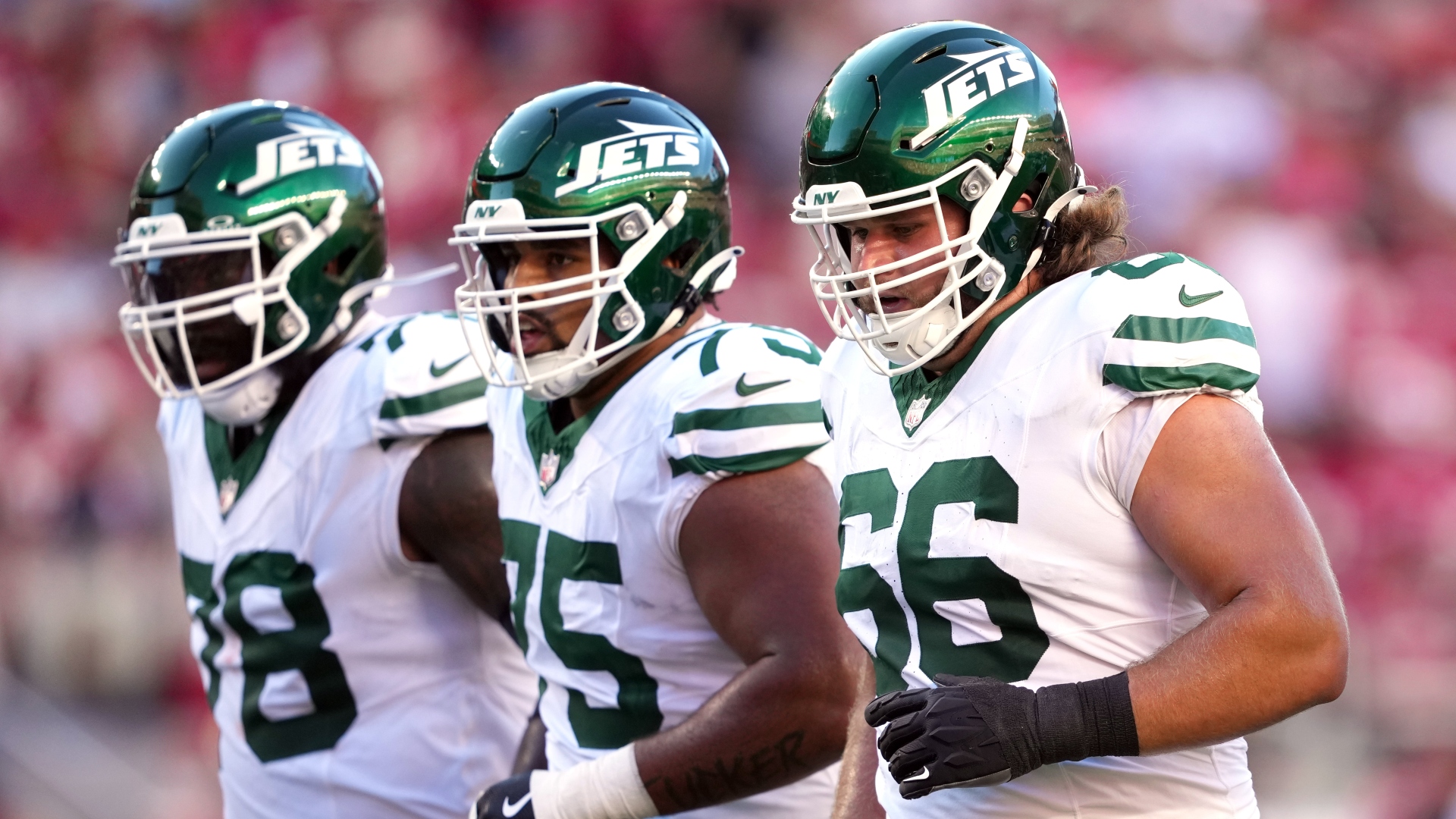 New York Jets center Joe Tippmann, offensive tackle Morgan Moses, guard Alijah Vera-Tucker
