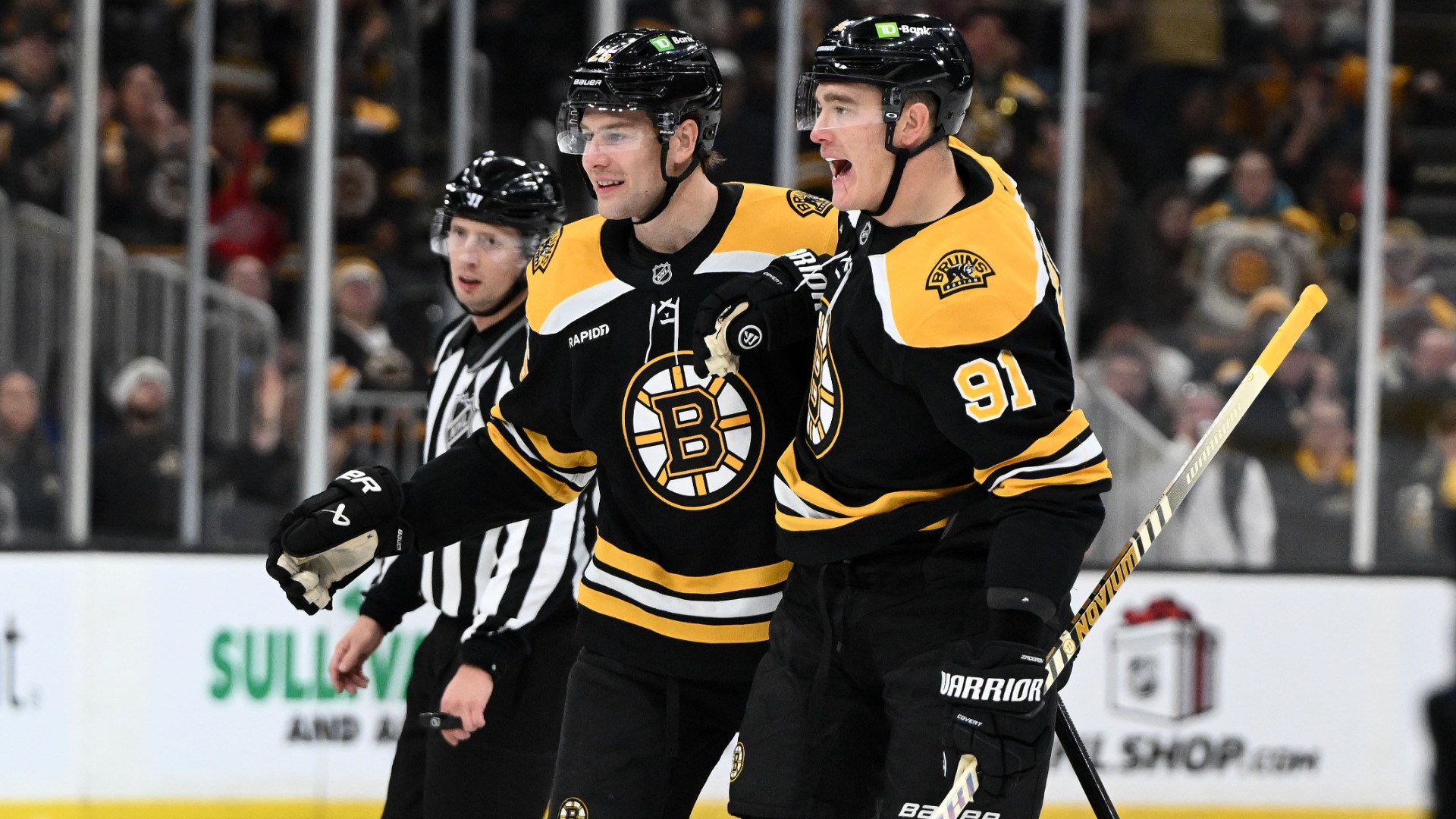Boston Bruins defensemen Brandon Carlo and Nikita Zadorov