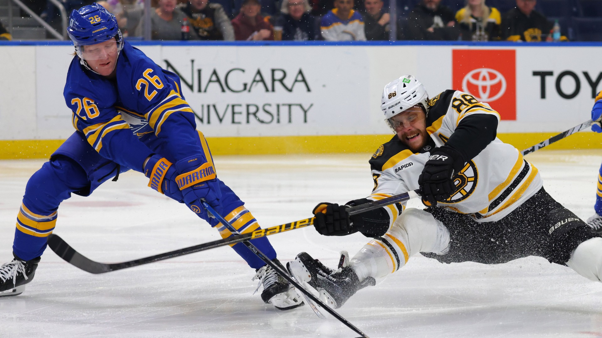 Boston Bruins forward David Pastrnak and Buffalo Sabres defenseman Sabres defenseman Rasmus Dahlin