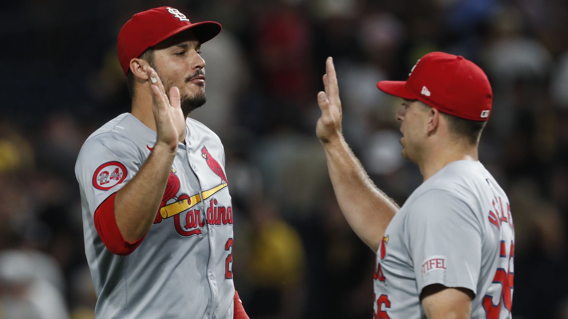 St. Louis Cardinals third baseman Nolan Areando and pitcher Ryan Helsley