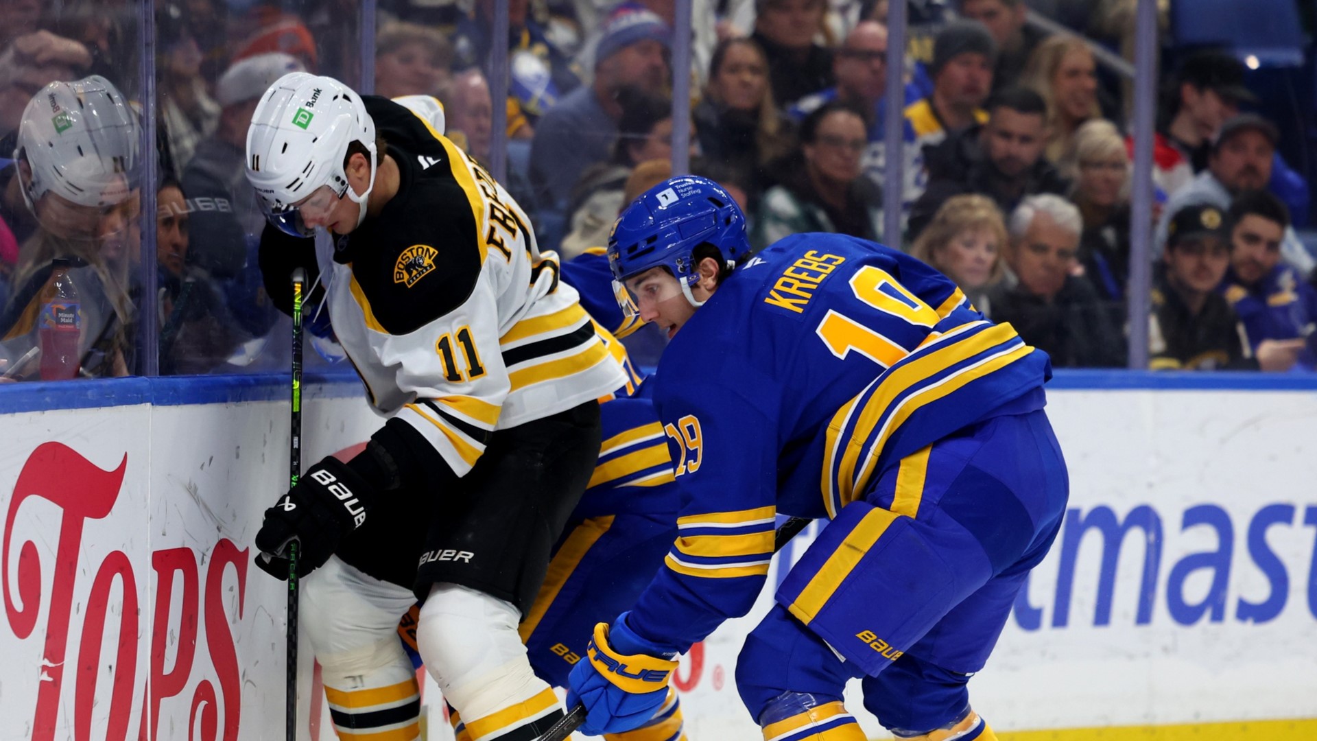 Boston Bruins center Trent Frederic, Buffalo Sabres center Peyton Kreb