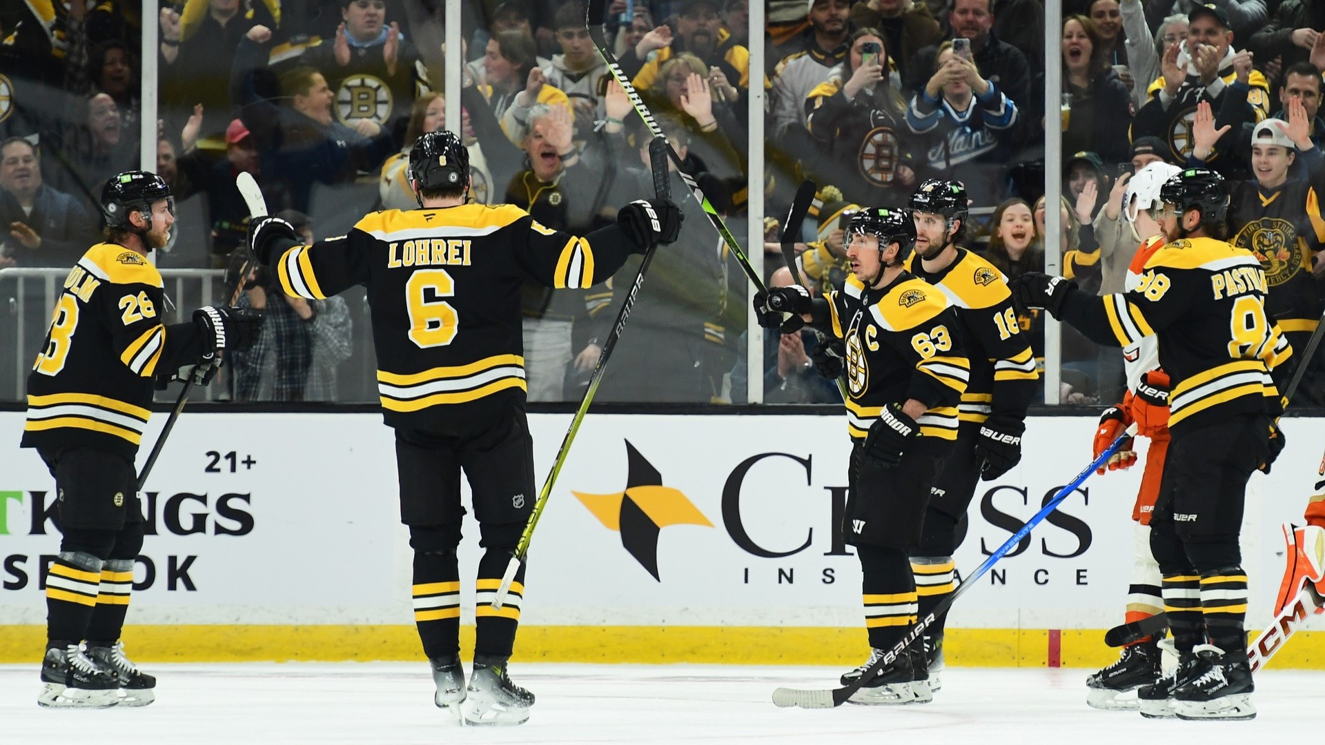 Boston Bruins defenseman Mason Lohrei, forward Elias Lindholm